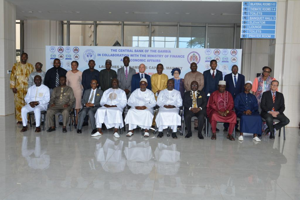 A group of people posing for a photo  Description automatically generated